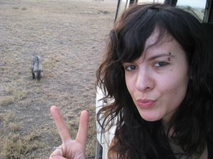 Sarah Benhaiem waiting for a faecal sample from a spotted hyena in the Serengeti National Park.©Sarah Benhaiem