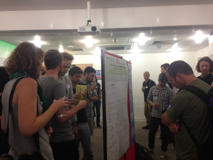 Attendees enjoy a wine reception (sponsored by MEE) whilst viewing posters and reflecting on the Reproducible Research panel discussion. Photo credit: Leila Walker
