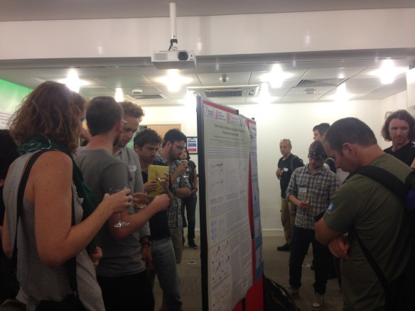 Attendees enjoy a wine reception (sponsored by MEE) whilst viewing posters and reflecting on the Reproducible Research panel discussion. Photo credit: Leila Walker