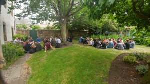 Group discussions taking place in the garden at BES Macro 2018. © Tom August