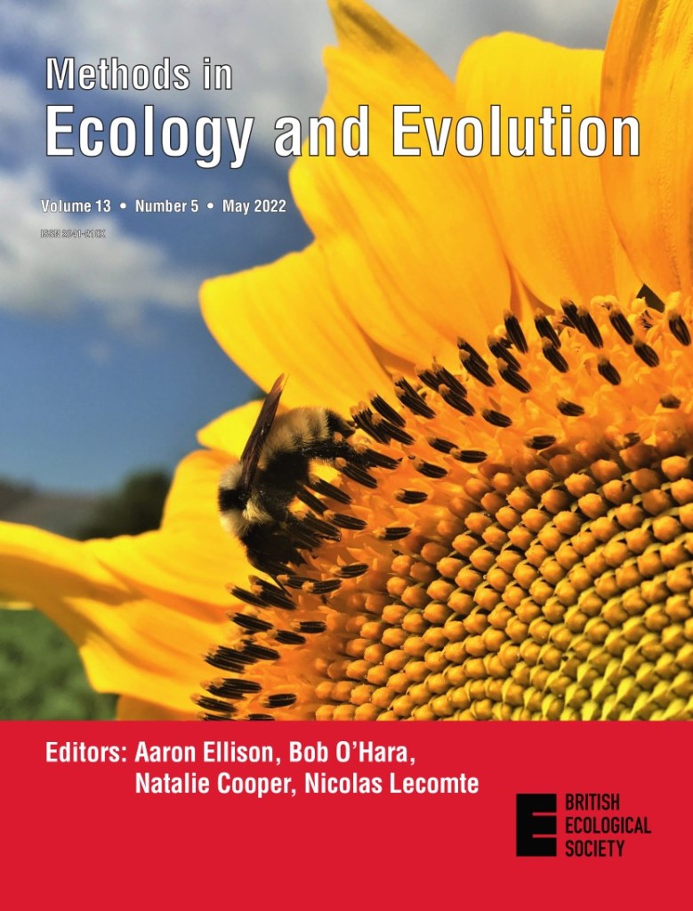 The cover of the May issue of MEE, showing a bumble bee on a sunflower.